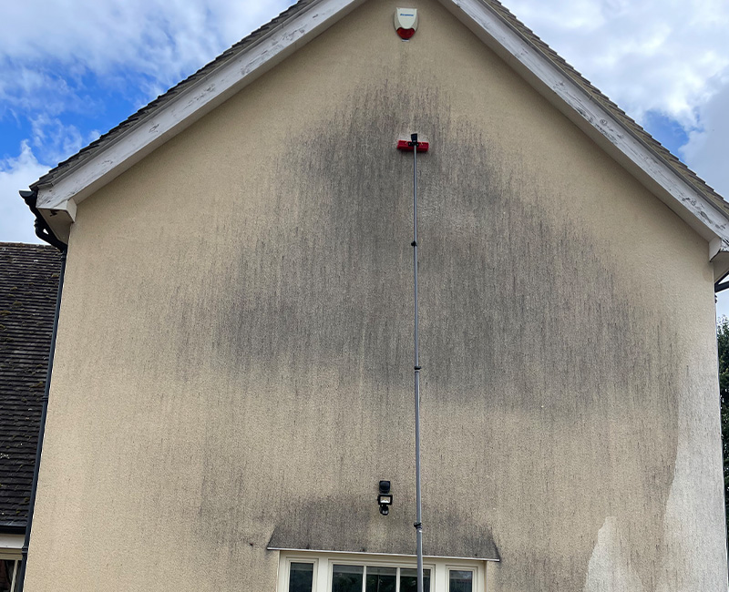 brick house exterior with large windows showcasing seven architectural elements and details