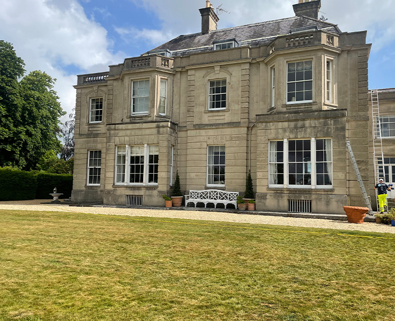 tennis court surface with net and shadows including the number 7 for match play